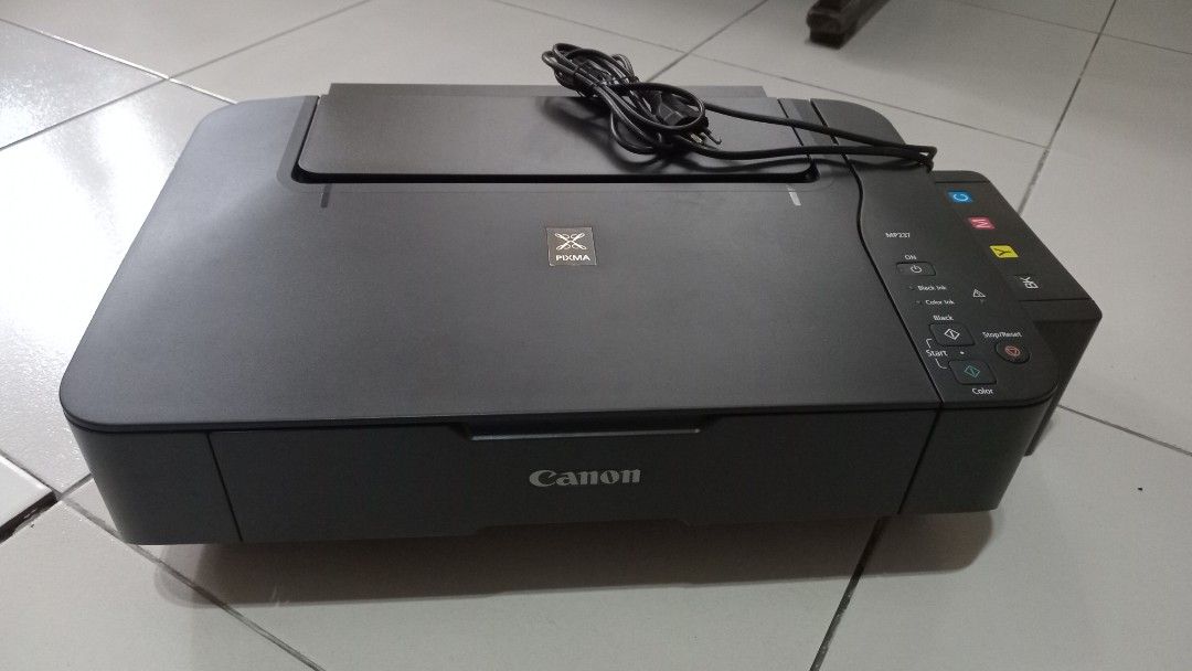 Canon PIXMA MP237 Print-Copy-Scan Printer (Category: Printers, Scanners & Copiers) located in Binangonan. Submitted by junyodeuxign (Listing ID 1459559861, Image 1). Description: Canon PIXMA MP237 multifunction printer — Print / Scan / Copy • Bought in 2021 • Lightly used • With continuous ink system installed • Printer has been stored and is no longer regularly used • Ink cartridge needs replacement • Continuous ink setup/tubing also needs repla