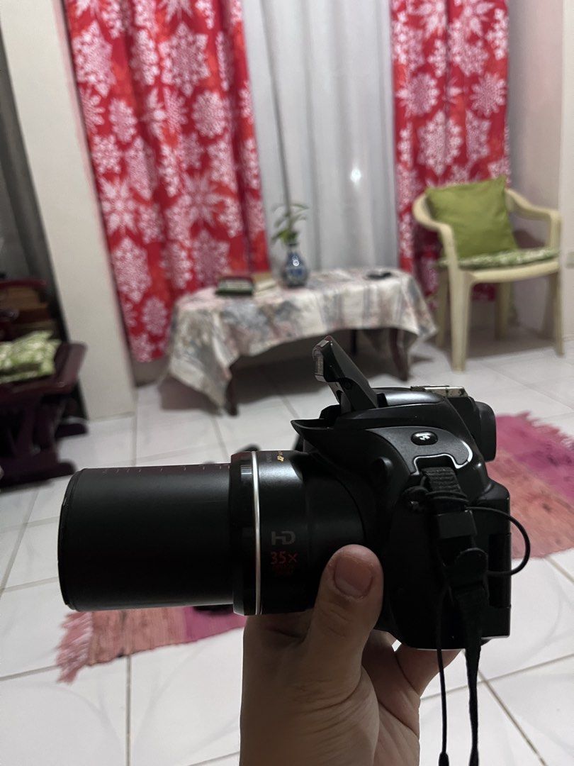 Canon PowerShot SX30 IS Digital Camera with Accessories (Category: Cameras) located in Manila. Submitted by valerianok00376 (Listing ID 1459683877, Image 3). Description: - Canon PowerShot SX30 IS camera - Canon camera bag included - Tripod with bag - Two (2) batteries - Battery charger - Neck strap - Ideal for travel and everyday photography - Ready for your next adventure! HONEST ISSUE -- DOT ON DISPLAY SCREEN (DOES NOT AFFECT OUTPUT QUALITY) R