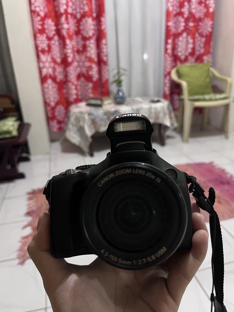 Canon PowerShot SX30 IS Digital Camera with Accessories (Category: Cameras) located in Manila. Submitted by valerianok00376 (Listing ID 1459683877, Image 2). Description: - Canon PowerShot SX30 IS camera - Canon camera bag included - Tripod with bag - Two (2) batteries - Battery charger - Neck strap - Ideal for travel and everyday photography - Ready for your next adventure! HONEST ISSUE -- DOT ON DISPLAY SCREEN (DOES NOT AFFECT OUTPUT QUALITY) R