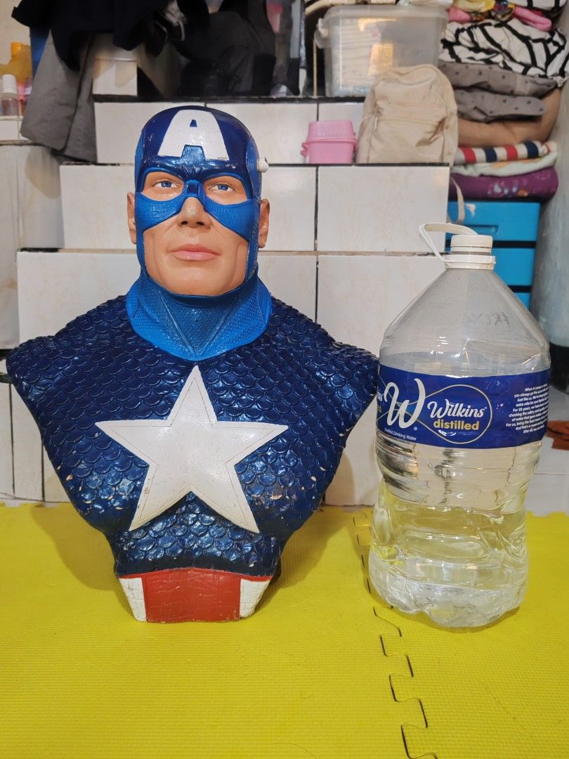 Captain America figure - no markings (Category: Figurines & Statues) located in Pasig City. Submitted by geraldnee28280 (Listing ID 1459558404, Image 3). Description: - Captain America bust, perfect for Marvel fans. - Paint has minor chips and scuffs, particularly on the helmet. - Suit details remain clear and well-defined. - A solid and impressive display piece for any collection..