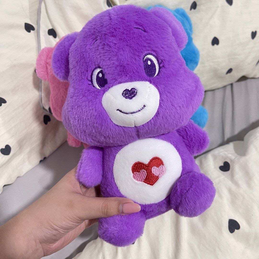 Care Bears Plush Toys (Category: Plushies & Soft Toys) located in Manila. Submitted by mallowieee (Listing ID 1459589677, Image 2). Description: 350 EACH, 1000 SET OF 3 - Set of 3 classic Care Bears plush toys - Includes: Purple Bear (heart), Pink Bear (sun), Blue Bear (clover) - Super soft and cuddly material - Ideal for collectors or as a thoughtful gift - Relive the nostalgia with these beloved characters.