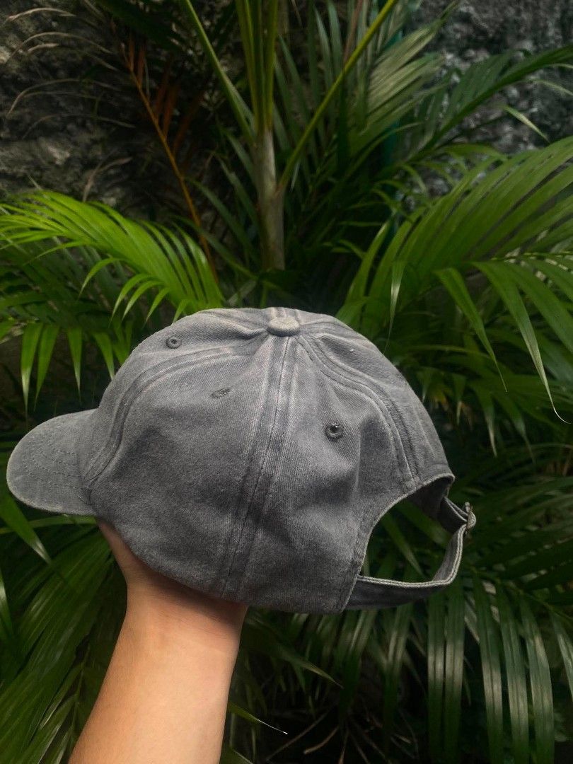 Carhartt Grey Baseball Cap (Category: Caps & Hats) located in Manila. Submitted by el_tigrematador (Listing ID 1459687424, Image 2). Description: - Classic grey Carhartt dad hat style. - Features the iconic Carhartt logo patch on the front. - Adjustable strap at the back for a customizable fit. - Simple and versatile headwear for any occasion..