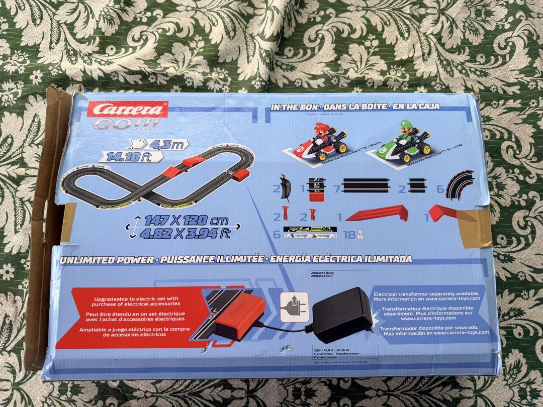 Mario Toy (Category: Vehicle & Diecast Models) located in Quezon City. Submitted by trishanelle (Listing ID 1459510957, Image 2). Description: - Carrera GO!!! Mario Kart slot car racing set - Includes Mario and Luigi cars - Track length: 4.3m (14.1 ft) - Battery operated cars and controllers - Expandable with electric sets and accessories - Transformer sold separately.