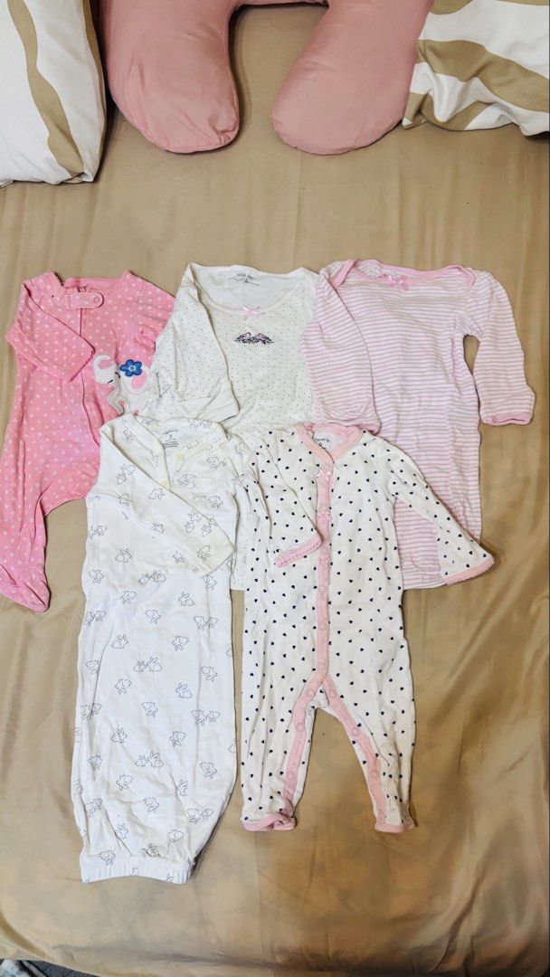 Carters Baby Sleepers Bundle (7 pcs) (Category: Babies & Kids Fashion) located in Quezon City. Submitted by mommyclutter (Listing ID 1459546207, Image 2). Description: - Bundle of 11 baby sleepers - Assorted prints and colors (pink, white, light blue) - All sleepers have footies - Mix of long and short sleeves - Features both snaps and zippers for easy dressing - Perfect for keeping your baby warm and comfortable Selling my baby's preloved frogsu