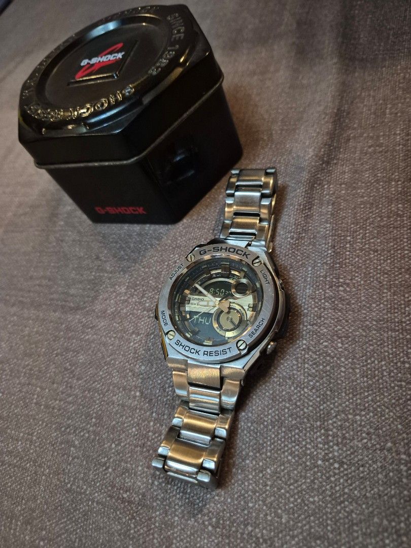 Casio G-Shock GST-210D-9A (Category: Men's Watches) located in Malabon City. Submitted by wes_royo (Listing ID 1459633419, Image 2). Description: - G-Shock GST-210D-9A - Includes original G-Shock tin box and tag - Includes spare links - Missing manual - Missing foam inside tin.