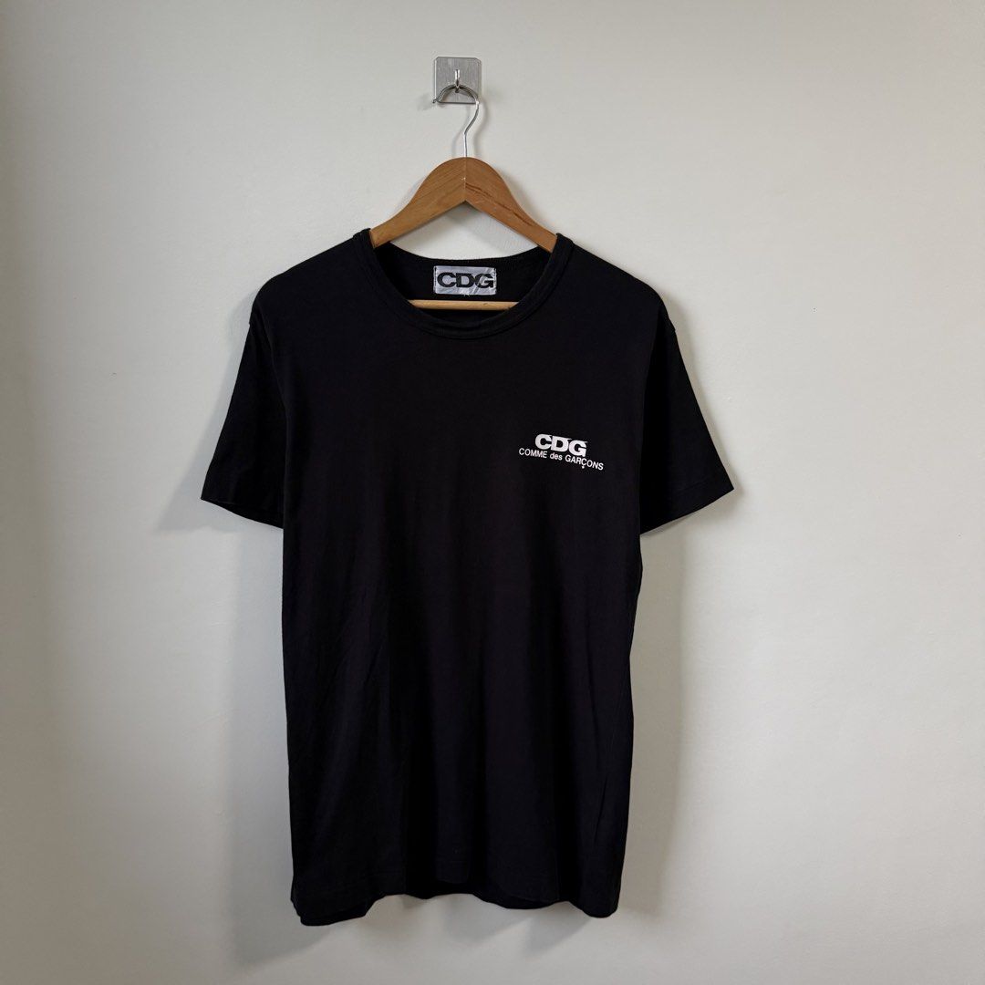 CDG Chest Logo Design (Category: Tshirts & Polo Shirts ) located in Paniqui. Submitted by justyntrouves (Listing ID 1459511597, Image 1). Description: (Legit/ Authentic✅) Tag Size: Medium (Dimensions in inches) Width: 20 Length: 29 Condition: 9/10 Buyer will shoulder the shipping fee. Check all photos before purchasing. For any questions, feel free to ask..