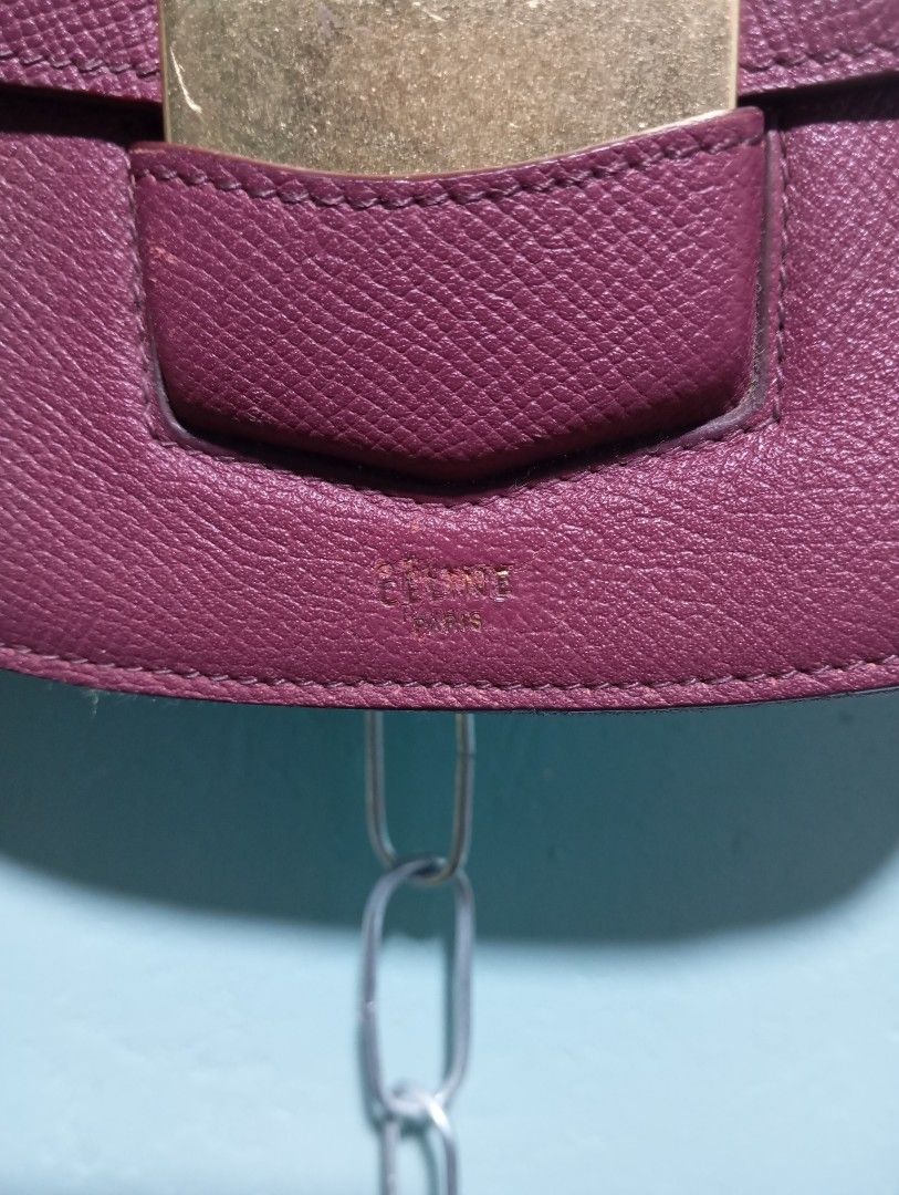 C.E.L.I.N.E. Small Trotteur Bag (Category: Cross-body Bags) located in Quezon City. Submitted by thesecondmarketph (Listing ID 1459664986, Image 3). Description: - C.E.L.I.N.E. crossbody bag in a rich burgundy hue. - Elegant gold-tone clasp closure for secure fastening. - Practical interior with one zippered pocket and one slip pocket. - Expertly crafted in Italy. - Serial number F-CL-1135 stamped inside for authenticity. - 7x6.