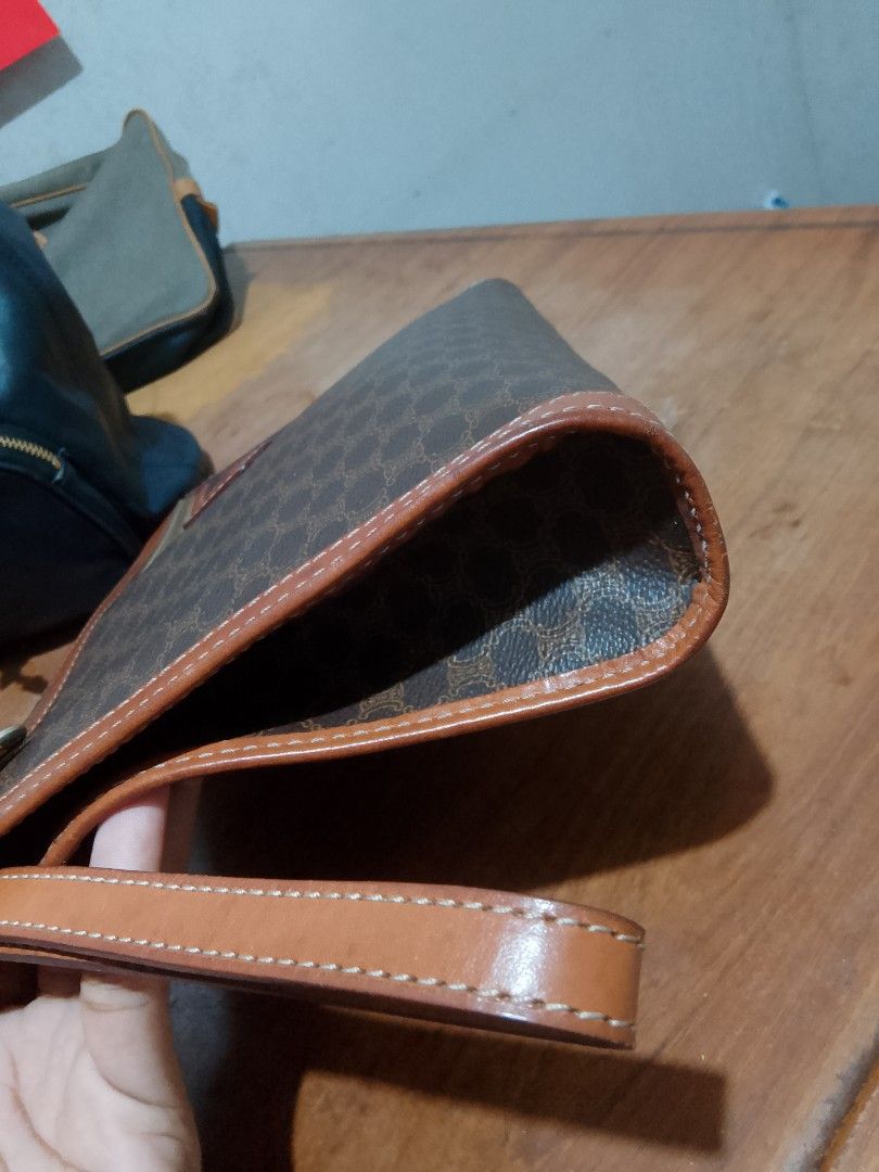 Celine Macadam Pattern Clutch Bag with Leather Trim (Category: Luxury Bags & Wallets) located in Parang, Maguindanao. Submitted by goldenowl.9a21c3 (Listing ID 1459657337, Image 3). Description: - Authentic Vintage Celine Clutch - Iconic Macadam Pattern - Rich Brown Leather Trim - Secure Zipper Closure - Convenient Leather Wrist Strap - Celine Paris Made in Italy Interior Label - Ideal for carrying your daily essentials.