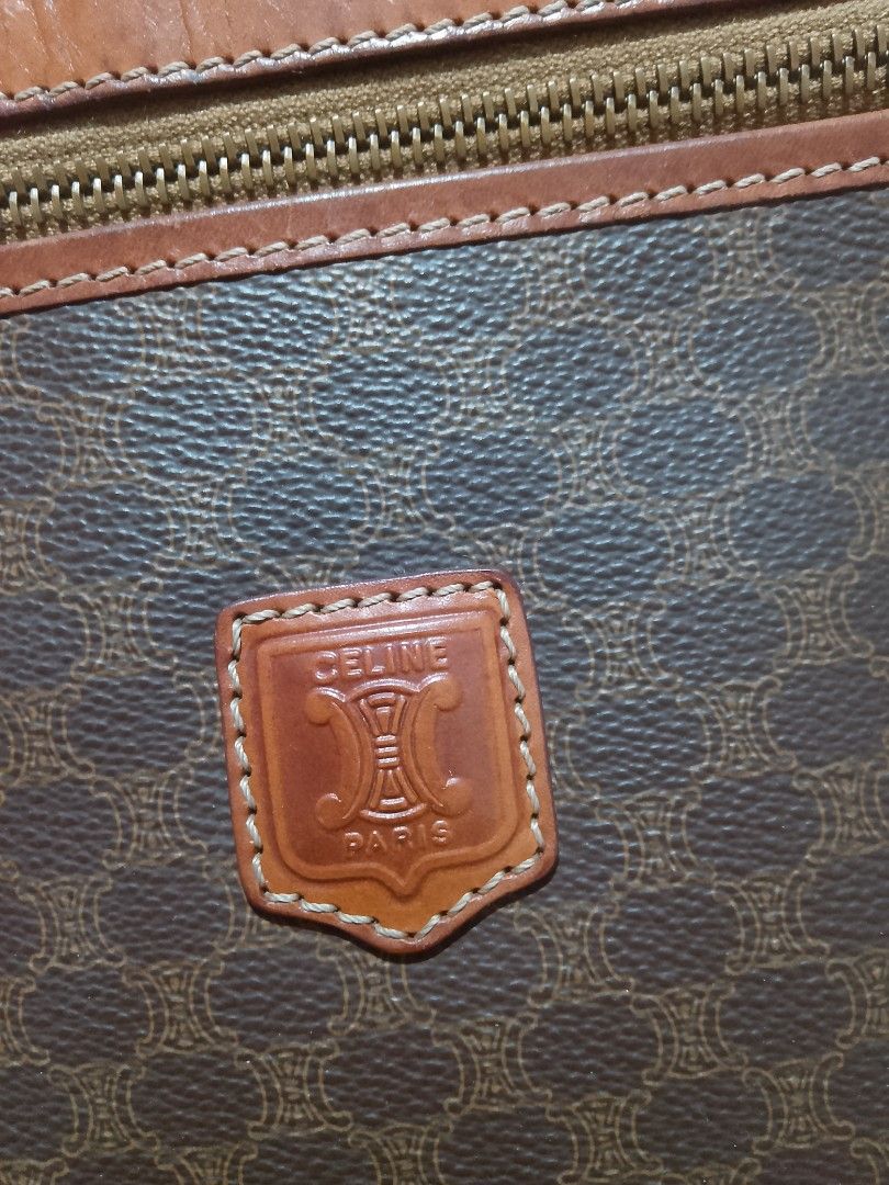 Celine Macadam Pattern Clutch Bag with Leather Trim (Category: Luxury Bags & Wallets) located in Parang, Maguindanao. Submitted by goldenowl.9a21c3 (Listing ID 1459657337, Image 2). Description: - Authentic Vintage Celine Clutch - Iconic Macadam Pattern - Rich Brown Leather Trim - Secure Zipper Closure - Convenient Leather Wrist Strap - Celine Paris Made in Italy Interior Label - Ideal for carrying your daily essentials.