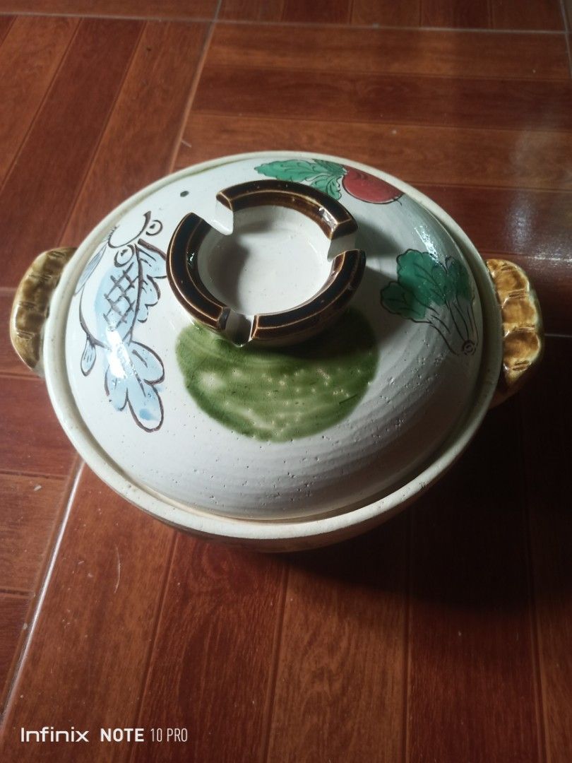Ceramic Pot with Lid - Fish and Vegetable Design (Category: Cookware & Accessories) located in Rizal. Submitted by andreisnow (Listing ID 1459492188, Image 1). Description: Cute ceramic pot with lid, featuring fish and vegetable designs. Has handles for easy carrying. Perfect for cooking or decor..