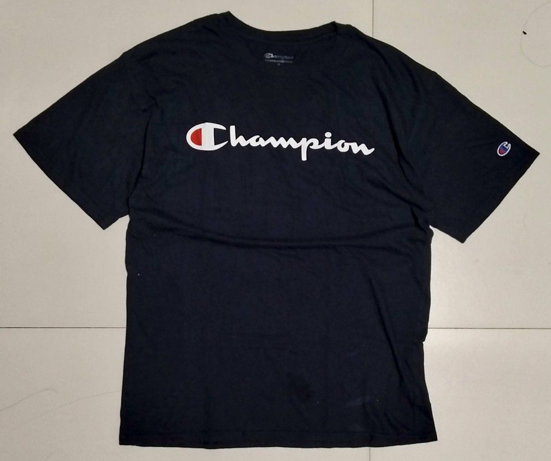 Champion Script Logo T-Shirt (Category: Tshirts & Polo Shirts ) located in Tarlac. Submitted by smokecoloredgirl (Listing ID 1459624997, Image 1). Description: Medium L28" x W21".