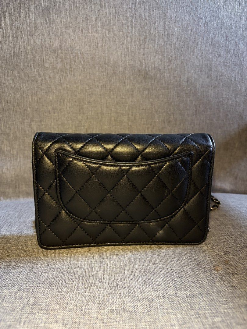 Chanel Black Quilted Lambskin Wallet on Chain (Category: Luxury Bags & Wallets) located in Muntinlupa City. Submitted by mimikyvu (Listing ID 1459542006, Image 2). Description: 🏷️ ₱1,199 (nego ₱1,099) ❦ 7/10 cosmetic condition ❦ classic chanel wallet on chain ❦ black lambskin leather ❦ multiple card slots ‼️ ISSUES: -signs of wear - NOT coded (i think it's a class A replica) 💫 INCLUSIONS: ♡ bag itself 📌 BUY AT YOUR OWN RISK! No refunds & no re
