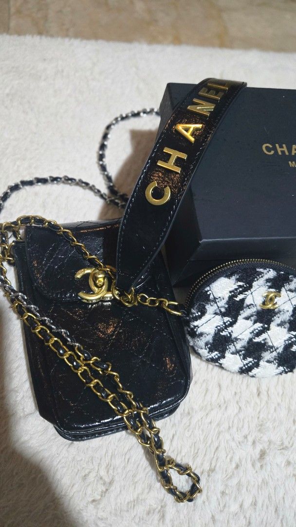 Chanel Phone Bag with Pouch and Box (Category: Luxury Bags & Wallets) located in Manila. Submitted by slouiserou10712 (Listing ID 1459598758, Image 3). Description: Selling my authentic GWP (gift with purchase) Chanel mini wrap/body bag with purse ❤️ Great condition Can fit pro max! OG box included ❤️ 4.9k only.