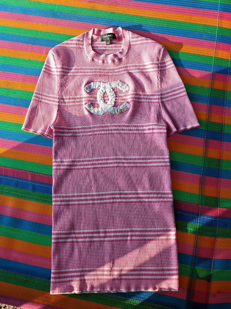 Chanel Pink White Gingham Knit top CC Logo (Category: Luxury Apparel) located in Manila. Submitted by ukayhuntworldwide (Listing ID 1459687873, Image 1). Description: - Authentic Chanel Knit Dress - Size: 36 - Color: Pink and White Gingham Pattern - Iconic CC Logo on Chest - Short Sleeves - Crew Neck - Material: Cotton Blend - Made in Italy.