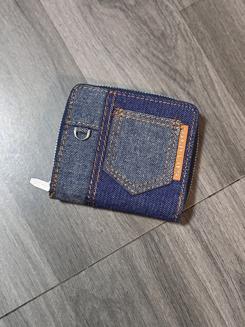Charles and Keith Denim Wallet (Category: Wallets & Card holders) located in Manila. Submitted by dreatantoy (Listing ID 1459636259, Image 1). Description: Charles and Keith Denim Wallet Mall pull out from Taiwan.