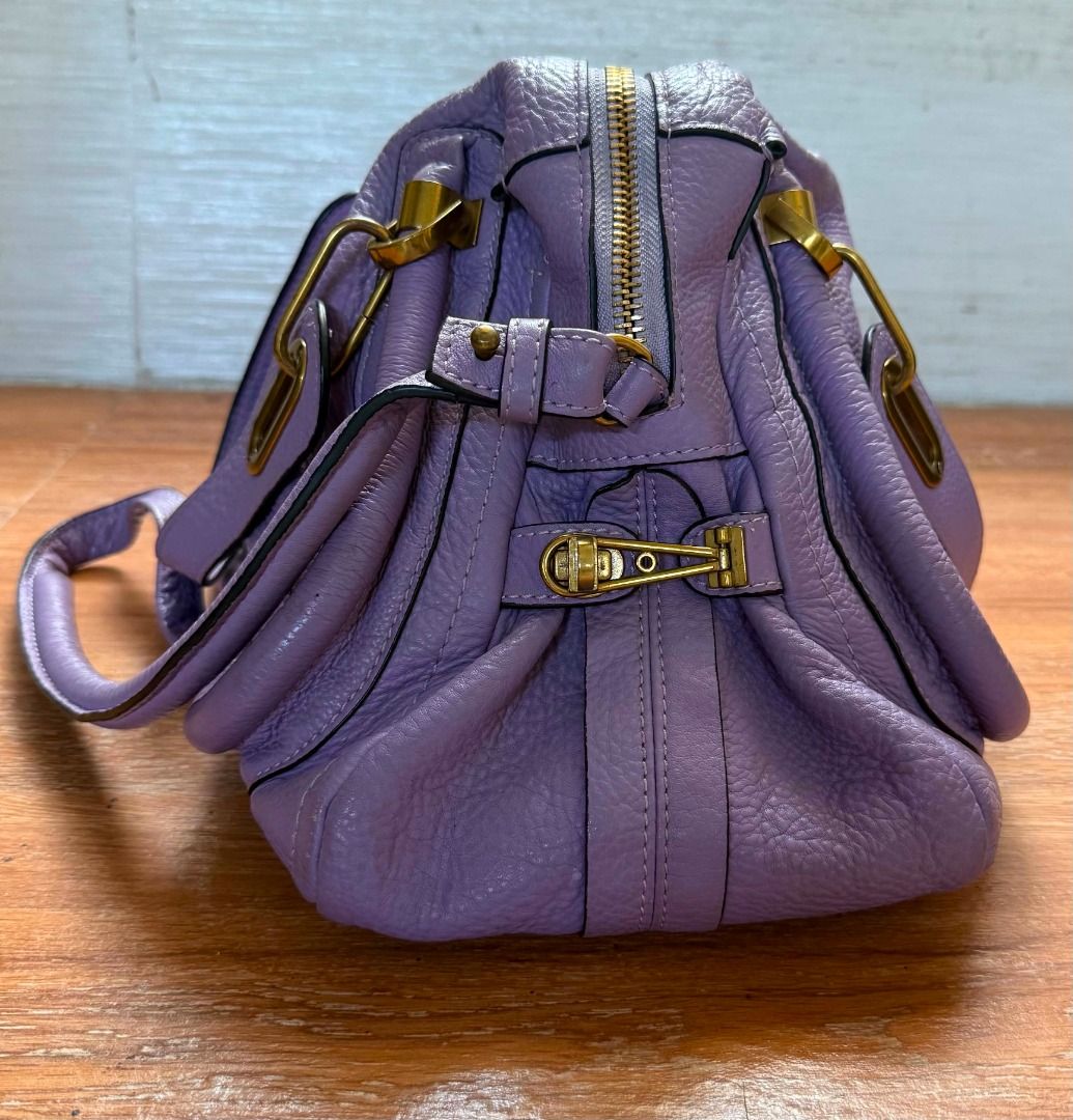 Chloe Paraty Bag Lavender Leather (Category: Luxury Bags & Wallets) located in Davao. Submitted by shophacks7 (Listing ID 1459561026, Image 2). Description: - Authentic Chloe Paraty Bag - Beautiful Lavender Pebbled Leather - Gold Hardware Details - Top Handles - Detachable Shoulder Strap - Zipper Closure - Interior Pockets - Made in Italy - Serial Number Visible in Photos.
