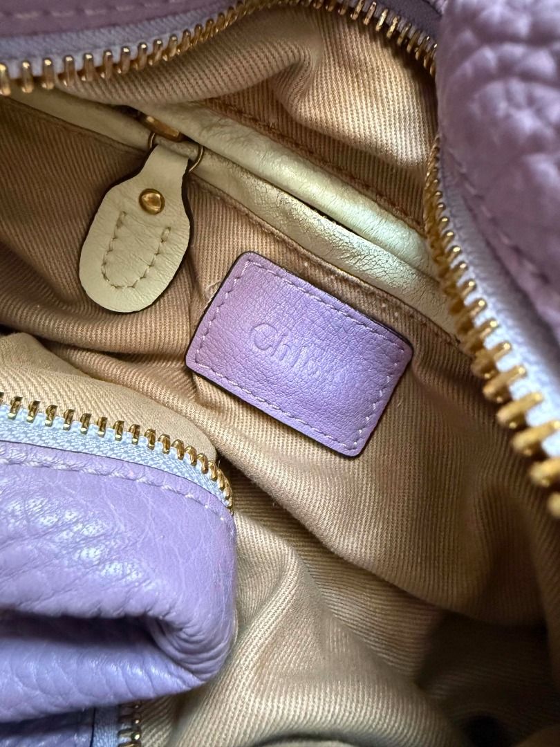 Chloe Paraty Bag Lavender Leather (Category: Luxury Bags & Wallets) located in Davao. Submitted by shophacks7 (Listing ID 1459561026, Image 3). Description: - Authentic Chloe Paraty Bag - Beautiful Lavender Pebbled Leather - Gold Hardware Details - Top Handles - Detachable Shoulder Strap - Zipper Closure - Interior Pockets - Made in Italy - Serial Number Visible in Photos.