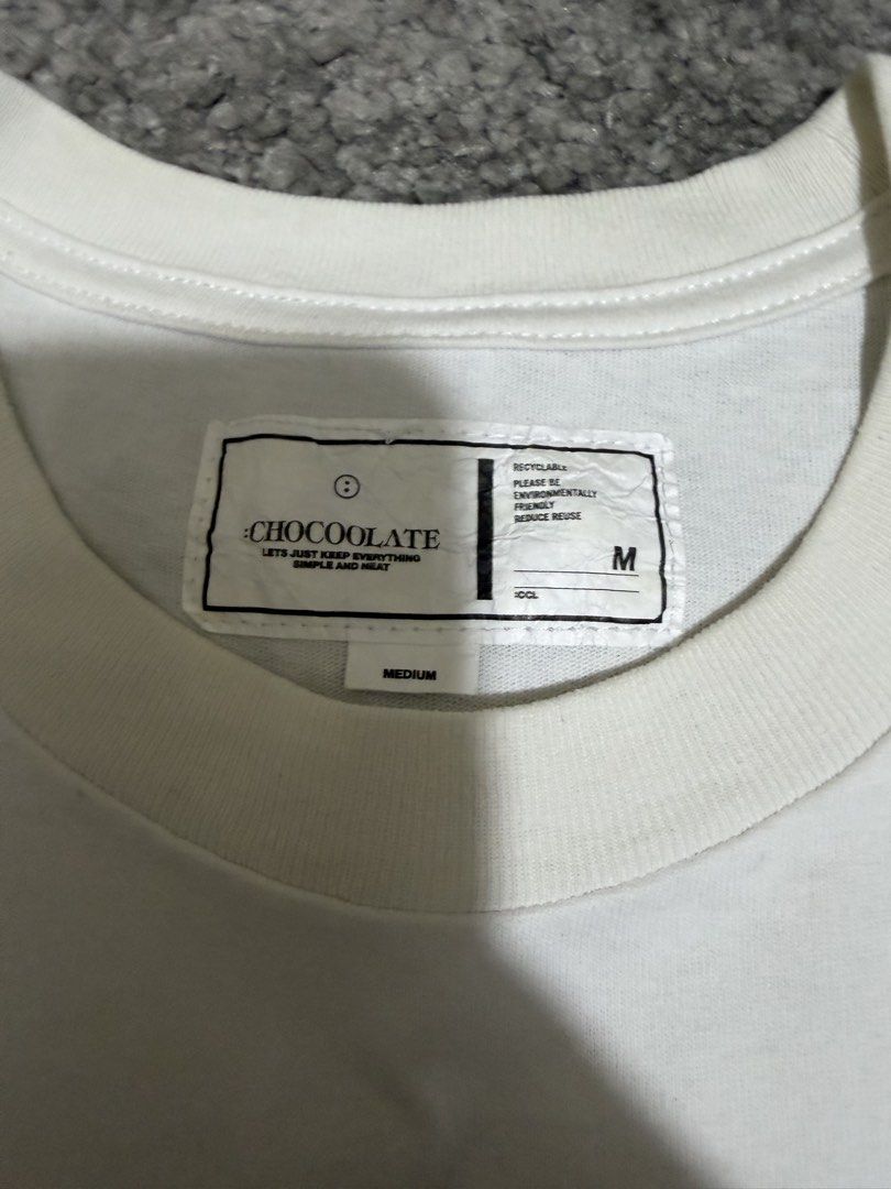 CHOCOOLATE BLK DEPT Graphic T-Shirt Medium (Category: Tshirts & Polo Shirts ) located in Paranaque City. Submitted by jaietyrone04915 (Listing ID 1459640004, Image 3). Description: - Brand: CHOCO LATE BLK DEPT. - Item: White Graphic T-Shirt - Graphic: Polar bear with 'GIVE ME A BREAK' text - Size: Medium - Condition: Good for casual wear.