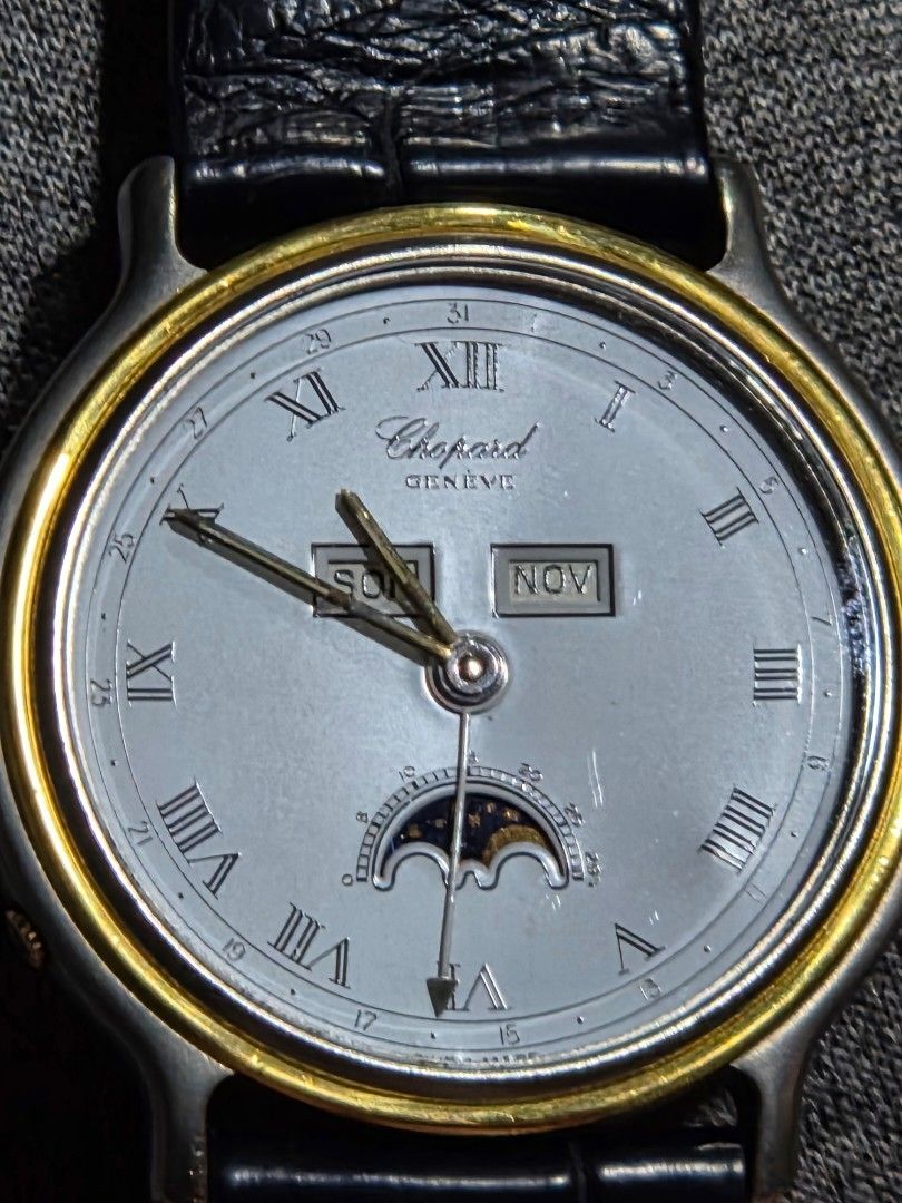 Chopard (Category: Watches) located in Kuala Lumpur. Submitted by ykc573733668 (Listing ID 1459531392, Image 3). Description: numbered example. Low production numbers like this were typically reserved for VIPs or individuals close to the company, adding significant provenance to this piece. The watch features a stunning white dial with Roman numerals, complemented by a sophisticated day/date display at 12 o'clock and an elegant moonphase complica