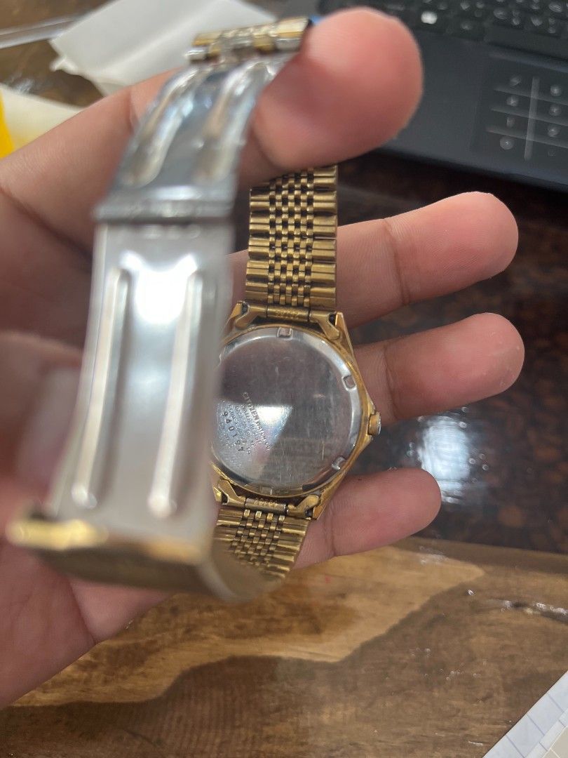 Citizen Gold Tone Watch Day Date (Category: Luxury Watches) located in Cebu City. Submitted by jbok_watches. (Listing ID 1459630163, Image 3). Description: - Gold tone Citizen watch - Features day and date display - Water resistant up to 30 meters - Classic link bracelet design - Secure fold-over clasp - Versatile for everyday wear or dressing up.