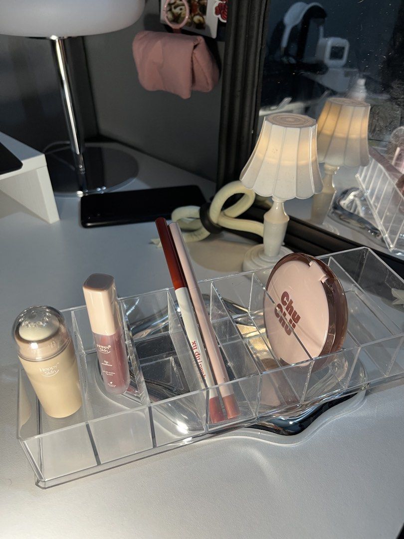 Clear Acrylic Makeup Organizer with Compartments (Category: Makeup) located in Dasmarinas. Submitted by chesnut97 (Listing ID 1459622873, Image 2). Description: - Clear acrylic makeup organizer - Multiple compartments for tidy storage - Fits lipsticks, powders, and small beauty items - Ideal for vanity or desk organization - Keeps essentials accessible and space neat - Easy to clean.