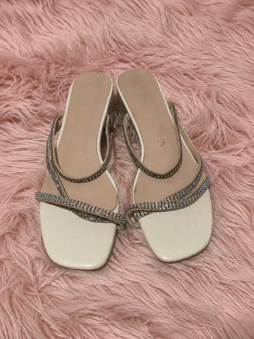 CLEAR HEEL RHINESTONE STRAPPY HEELS | SIZE: 37 (Category: Heels) located in Manila. Submitted by sakki.ph (Listing ID 1459659057, Image 2). Description: ♡ Cream / ivory + nude beige color ♡ Sparkly rhinestone/crystal strappy details (need cleaning) ♡ Clear chunky block heels ♡ Square/open-toe silhouette ♡ Elegant crisscross strappy design with rhinestone detailing ♡ Cute for Y2K, coquette, glam, party & going-out fits ♡ Easy to style with dresses