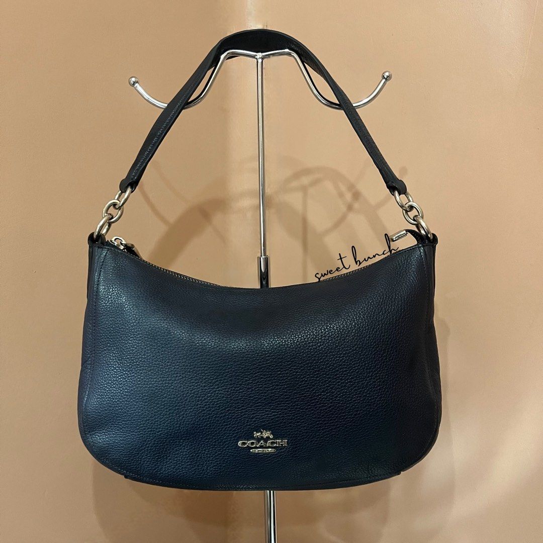 Coach Chelsea Navy Blue Bag (Category: Luxury Bags & Wallets) located in Taytay. Submitted by sweet_bunch (Listing ID 1459649008, Image 3). Description: Details: - Possible Model Number is N° K1780-56819. - Made from Pebbled Leather. - Bag comes with an ordinary dustbag. Condition: - 8/10 color rate, may sign of use sa leather. - May sign of use rin sa rubber lining and the creed no longer readable. - Hardware need to polish. - Selling for reason