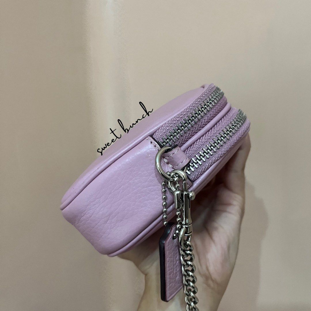 Coach Mini Jamie Lavender Crossbody Bag (Category: Luxury Bags & Wallets) located in Taytay. Submitted by sweet_bunch (Listing ID 1459653171, Image 3). Description: Details: - Model Number is N° D1922-F72490. - Bag comes with an ordinary dustbag. Condition: - May sign of use sa leather, barely noticeable. - Selling for reasonable price, so manage your expectation. Reminders: - If marked available, still available! - LAST PRICE POSTED, no to low b