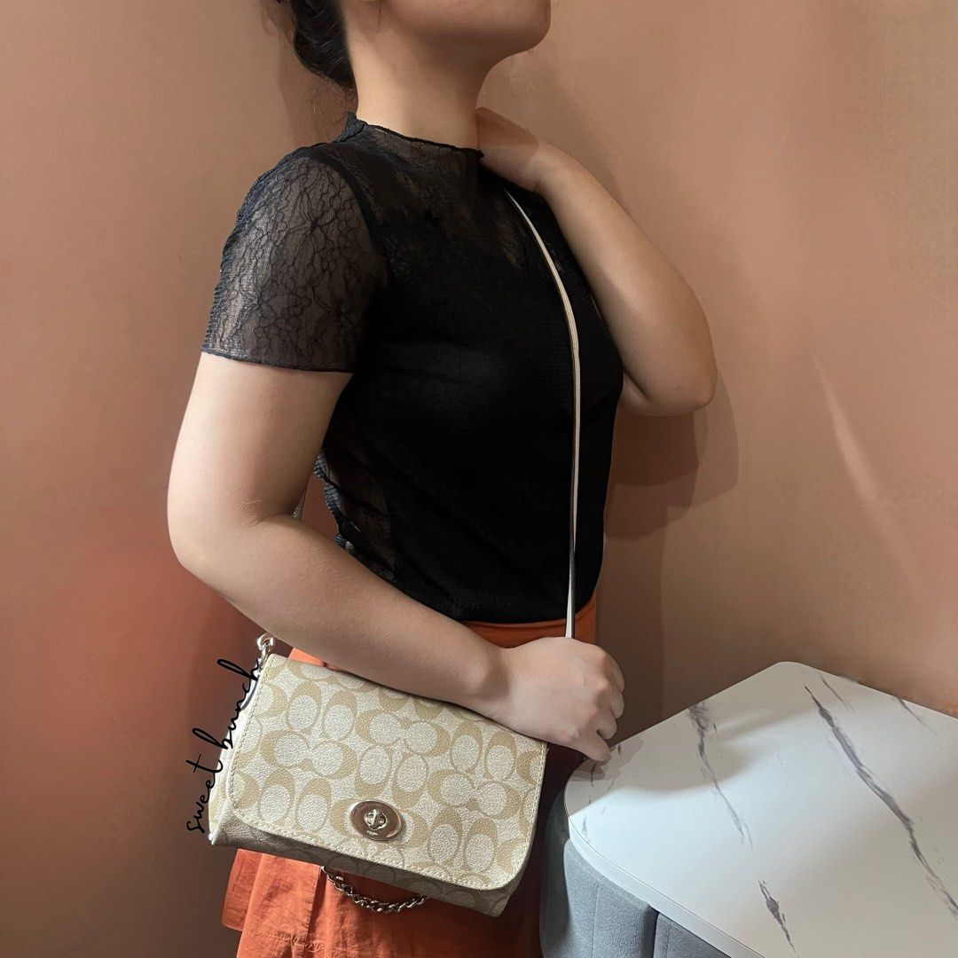 Coach Mini Ruby Signature Crossbody Shoulder Bag (Category: Luxury Bags & Wallets) located in Taytay. Submitted by sweet_bunch (Listing ID 1459655590, Image 3). Description: Details: - Model Number is N° F1482-34615. - Made from Coach Signature Patterned Leather. - Bag comes with an ordinary dustbag. Condition: - May sign of use sa leather part and hardware, barely noticeable. - Lightly madumi yung loob, optional naman if linisin kasi few parts l