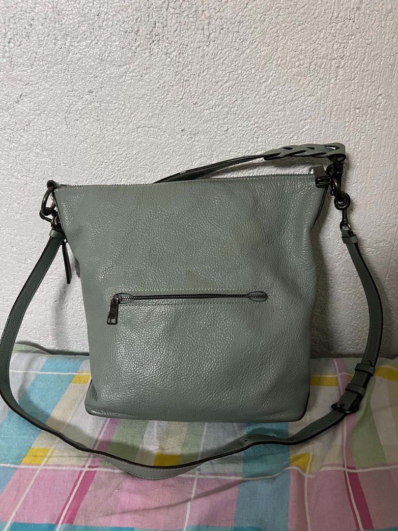 Coach Bag abby (Category: Announcements) located in Manila. Submitted by roxiee7878 (Listing ID 1459581177, Image 2). Description: - Light blue pebbled leather Coach hobo bag - Braided strap detail - Includes optional crossbody strap - Exterior zip pocket on the back - Multiple interior compartments - Gunmetal hardware - Comes with Coach hangtag.