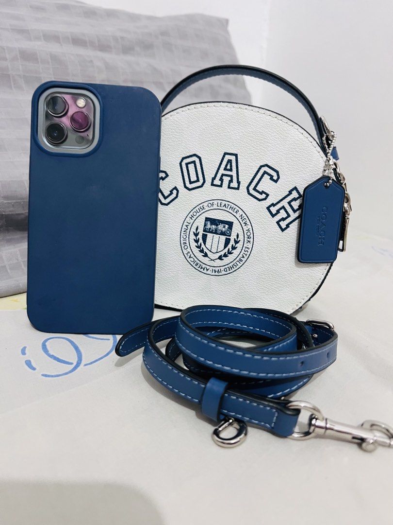 Coach Canteen Crossbody bag (Category: Luxury Bags & Wallets) located in Las Pinas. Submitted by lyrehs1981 (Listing ID 1459602680, Image 1). Description: - Adorable white Coach round bag - canteen-style silhouette constructed - Comes with a detachable blue strap - Includes a matching blue Coach hang tag - Interior has a small pocket - Ideal for everyday use.