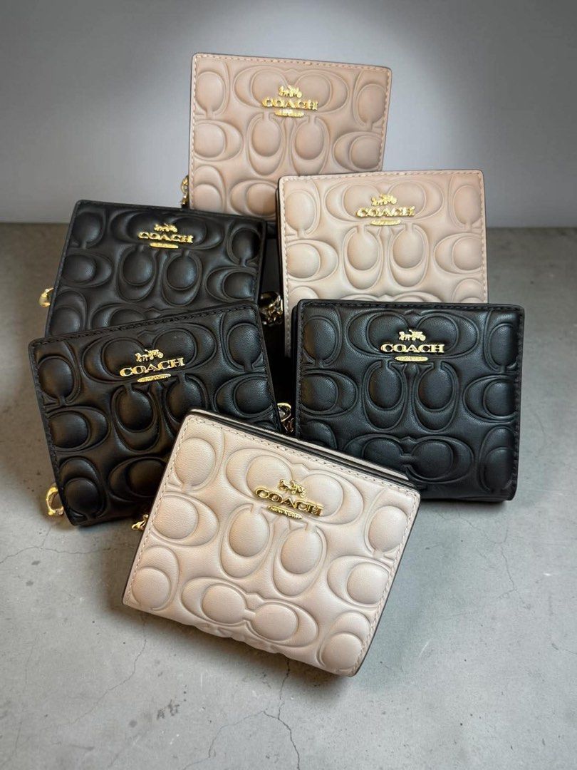 Coach Embossed Bifold Wallet (Category: Wallets & Card holders) located in Santa Rosa. Submitted by miqboutique (Listing ID 1459515121, Image 1). Description: Coach Embossed Bifold Wallet ₱3,499 + SF • Ready to ship • Guaranteed Original Fb page: Miq's Boutique.