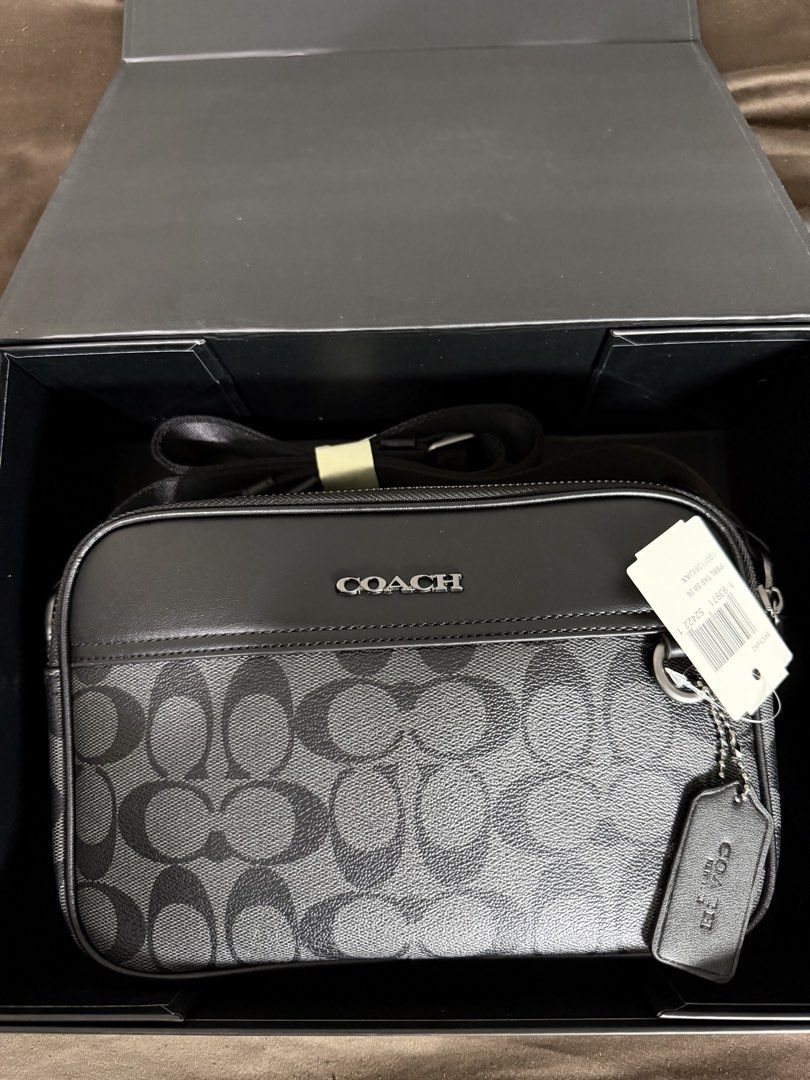 Coach Graham Crossbody (Category: Sling Bags) located in Makati City. Submitted by jamesluxefinds (Listing ID 1459674838, Image 2). Description: Authentic Mall Pull Out Size:26.7 cm (L) × 16.5 cm (H) × 5.7 cm (W) What Fits Inside ✅ iPhone Pro Max or similar large phone ✅ Long wallet or card holder ✅ Keys ✅ AirPods/earbuds ✅ Passport ✅ Small power bank ✅ Sunglasses (soft case) ✅ Charger cable Comes With Dust Bag and Box.