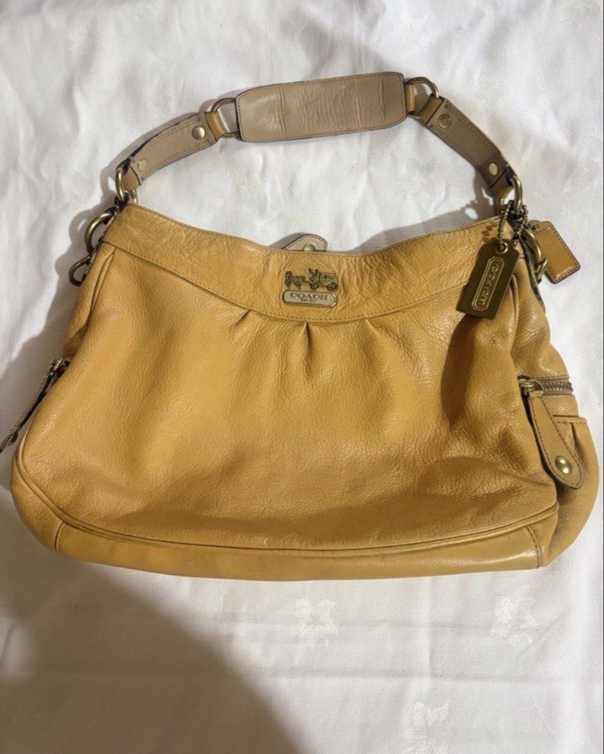 Coach Madison Leather Shoulder Bag (Category: Shoulder Bags) located in Cavite. Submitted by elle.nanasv (Listing ID 1459513889, Image 2). Description: -Manage your expectations because this bag is repainted - Broken Creed - May sling and shoulder sling - 2 hangtag.