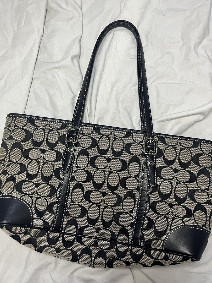 Coach Monogram Canvas Leather Trim Tote Bag (Category: Luxury Bags & Wallets) located in Midsayap. Submitted by ambsvnne (Listing ID 1459602928, Image 3). Description: NEGOTIABLE - Classic Coach tote bag - Signature monogram canvas - Black leather trim - Spacious interior for essentials - Comfortable straps for carrying - Timeless piece for everyday use - Great for work or casual outings.