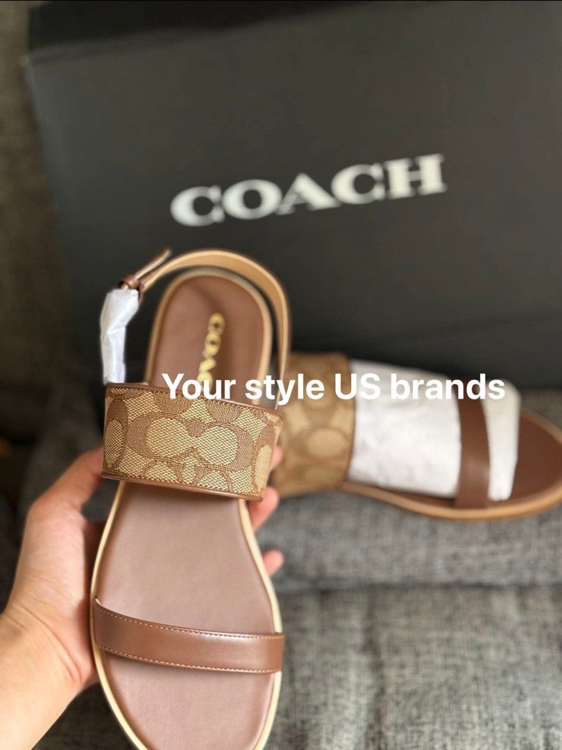 Coach Signature C Flat Sandals (Category: Flats & Sandals) located in Manila. Submitted by luxury_authentic_goods (Listing ID 1459660057, Image 1). Description: - Authentic Coach sandals - Signature C print - Brown leather straps and sole - Adjustable ankle strap - Size: 7.5 - Comes with original Coach box.