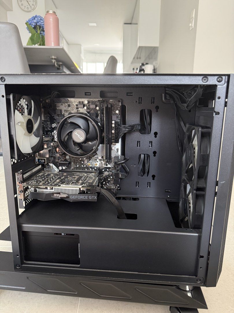 Computer/PC (Category: Desktops) located in Singapore. Submitted by c.singapore (Listing ID 1459653980, Image 3). Description: Gaming PC [Fully Serviced And Clean For Use Recently] * Ryzen 5 2600 * GTX 1650 Super 4GB * 8GB DDR4 RAM (forgot the brand) * ASRock A320M-HDV R4.0 * Lexar 256GB SSD * 500–550W PSU [Bronze Edition] * Windows 10 [Upgradeable] Fast Deal $250 Lowest Reason For Selling : Not Using Anymore.