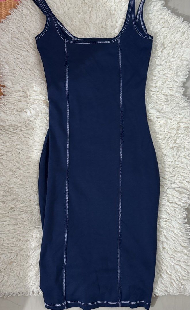 Cotton On Navy Blue Mini Dress (Category: Dresses) located in Muntinlupa City. Submitted by closetcorner_ (Listing ID 1459569422, Image 1). Description: - Navy blue mini dress from Cotton On - Can fit up to medium - Fitted silhouette.