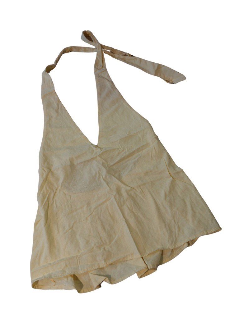Cream Halter Neck Top with Tie Back (Category: Sleeveless) located in Manila. Submitted by declutter.yna (Listing ID 1459631886, Image 1). Description: - yellow colored halter top - Ties at the neck and back - Lightweight and flowy fabric - Easy to style with shorts or a skirt.