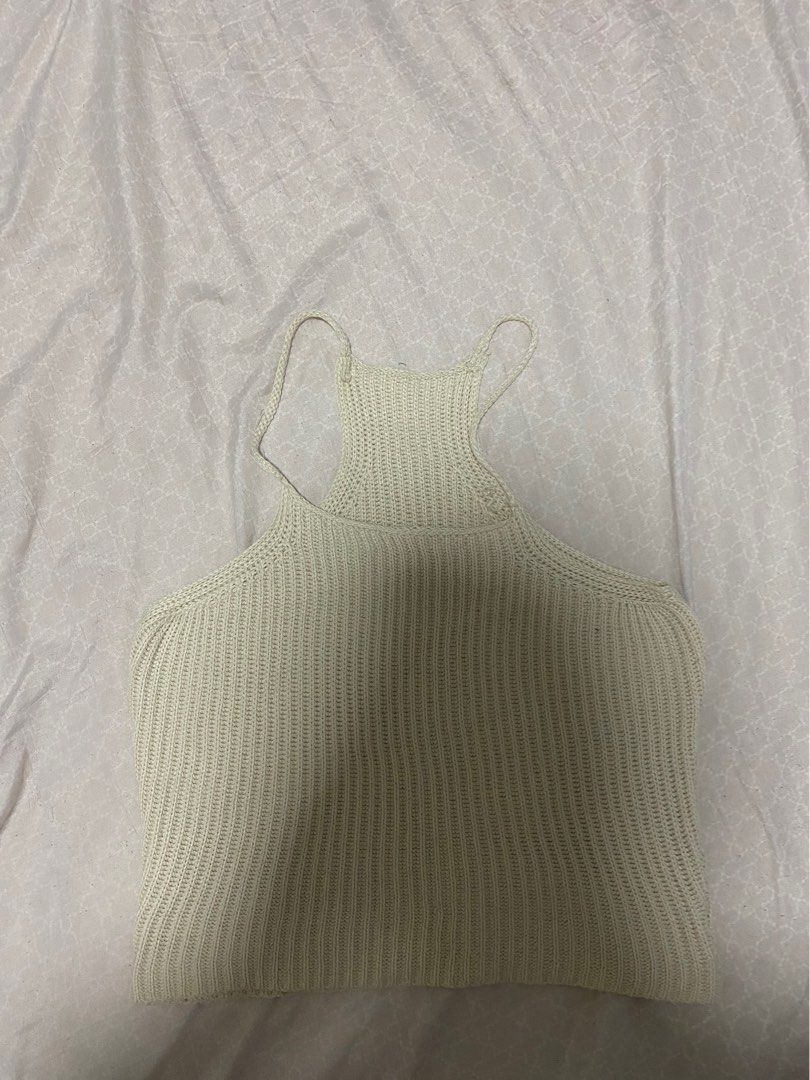 Cream Knit Cropped Tank Top (Category: Sleeveless) located in Quezon City. Submitted by jmxyz (Listing ID 1459619962, Image 1). Description: - Thin straps - Best fits size Small to Medium ‼️ moving out sale.