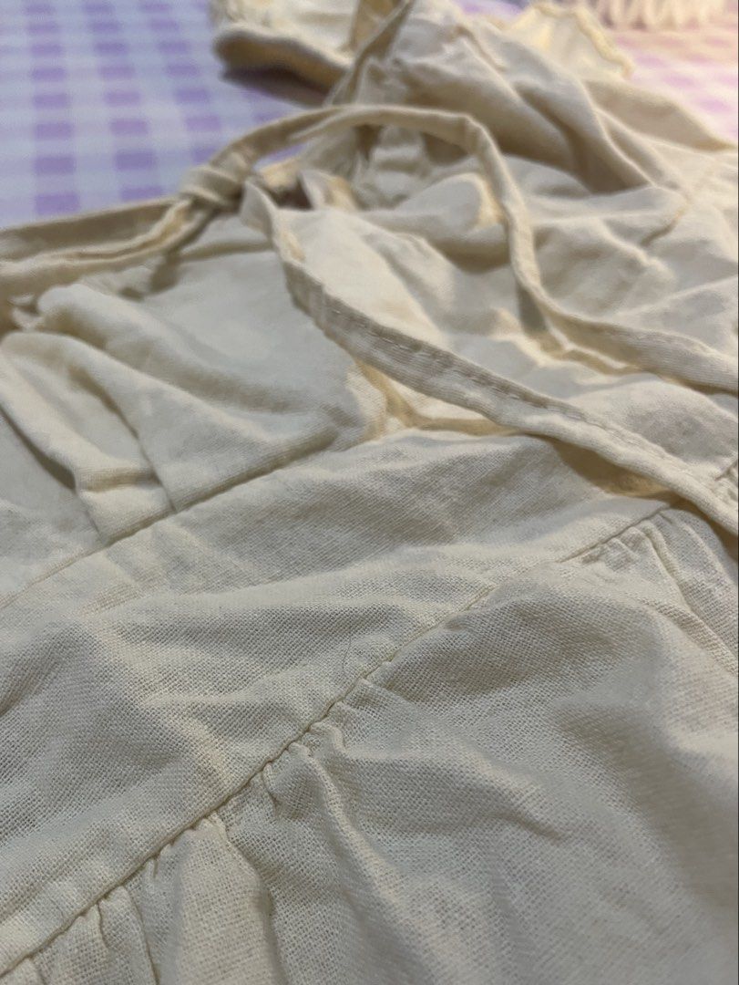 Cream Puff Sleeve Tie Front Peplum Top (Category: Blouses) located in Quezon City. Submitted by lovenzie (Listing ID 1459677985, Image 3). Description: ⋆˚꩜｡𐔌՞. .՞𐦯⋆. 𐙚 ˚ . . . 🛒🎐 - size small ! 🥨 - cream linen top - puff sleeves with tie front detail - peplum hem - has a really small rip (?) on the chest area, though unnoticable ( see in photo! ) 🛍️🍡 ౨ৎ⋆ ˚｡ mop: gcash shipping: lalamove / grab ( shipping fee will be shouldered by the buye