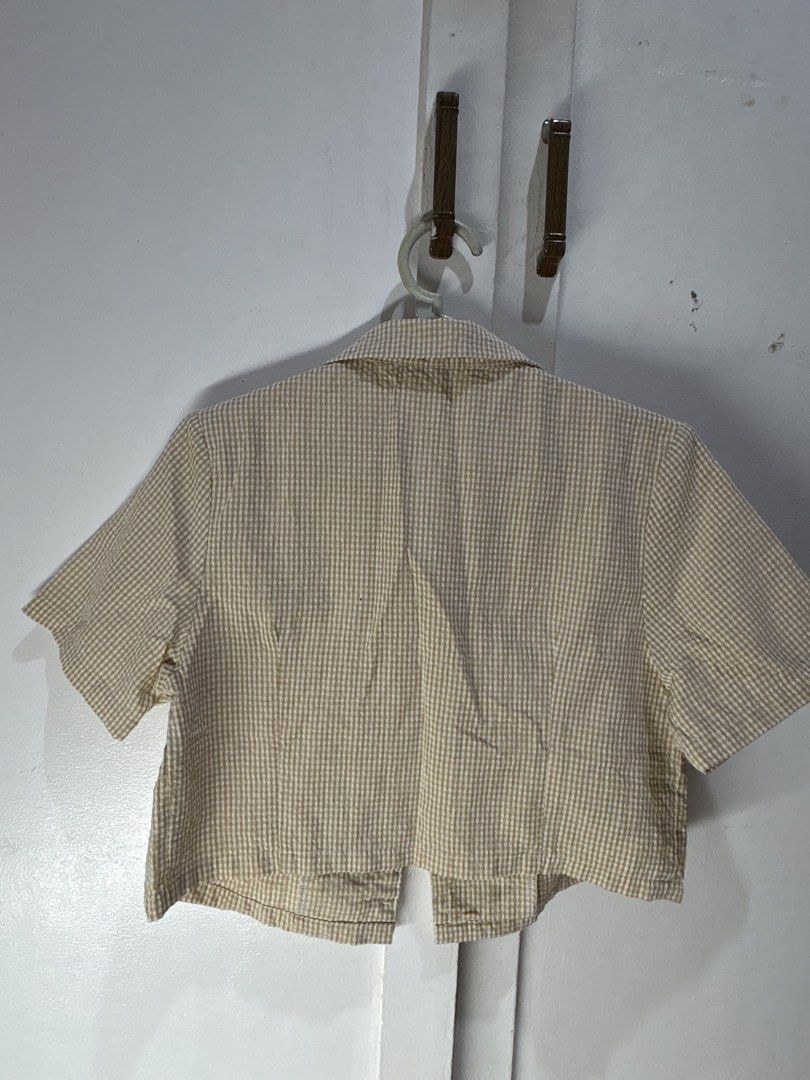 Crop Top and Shorts Set (Category: Sets or Coordinates) located in Malabon City. Submitted by julia4a_ (Listing ID 1459601836, Image 2). Description: - Adorable matching set in beige and white gingham. - Cropped short-sleeve top with button-up front. - High-waisted shorts with zipper and button closure. - Comfortable fabric, perfect for casual outings. - Can be worn together as a set or separately..