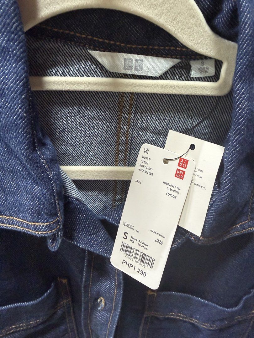 Cropped Denim Shirt with Pockets (Category: Others Tops) located in San Fernando. Submitted by mci.ph (Listing ID 1459615382, Image 2). Description: - Blue denim shirt - Short sleeves with collar - Two chest pockets with button closures - Cropped length - Versatile for casual styling with jeans or skirts.
