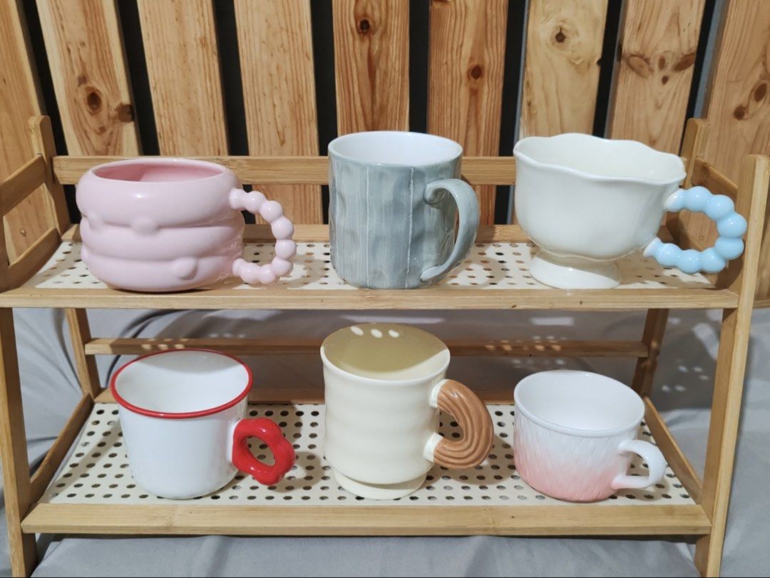 Cute/Kawaii Ceramic Mugs with Unique Handles (Category: Coffee & Tea Tableware) located in Quezon City. Submitted by lordeux.closet (Listing ID 1459567018, Image 3). Description: - Each mug features a distinct design - Fun, textured handles for a comfortable grip - Adorable animal and fruit designs available - Ideal for your daily coffee or tea - Makes a great gift for any occasion - Adds a playful and charming touch to your kitchenware.