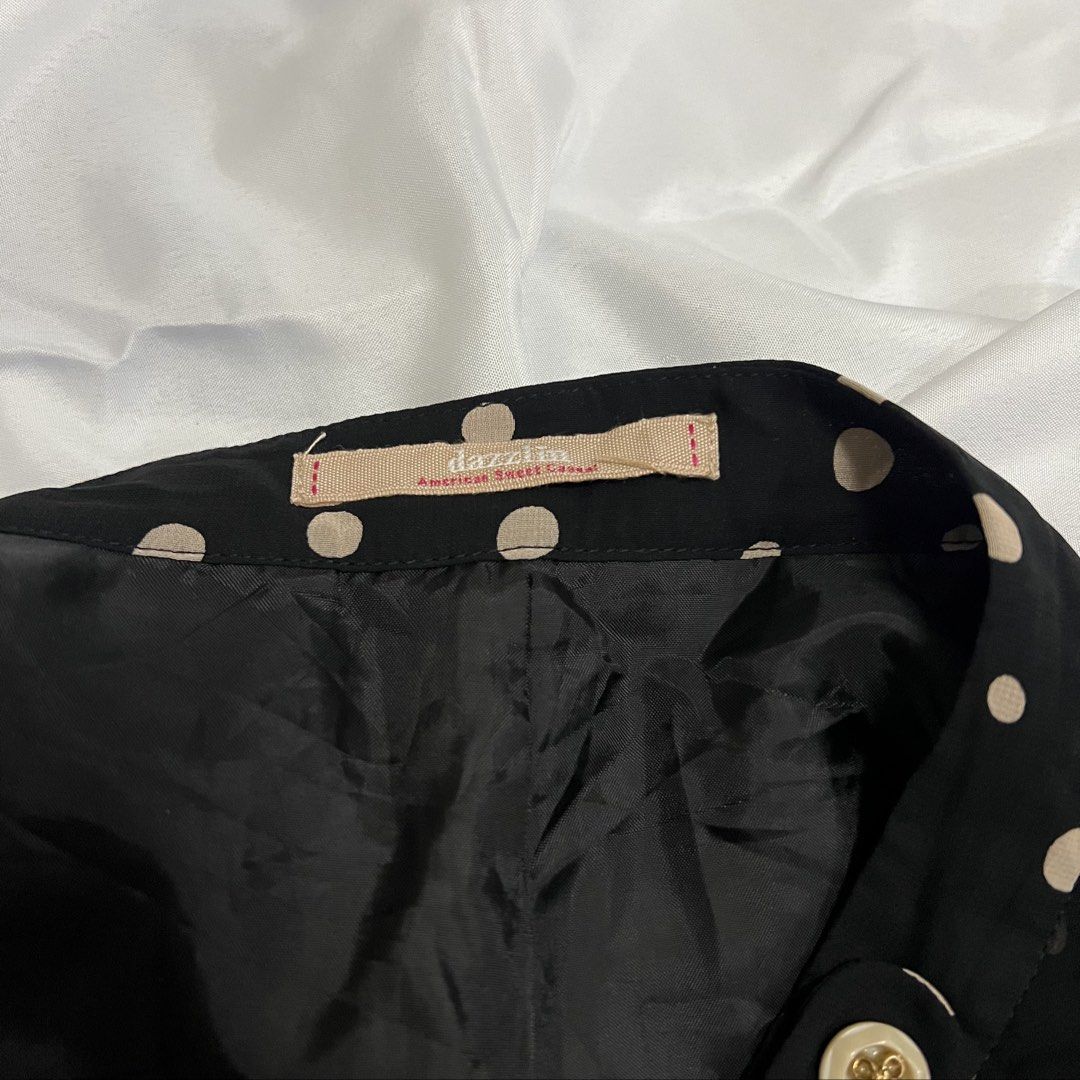 Dazzlin Black Polka Dot Ruffle Shorts (Category: Shorts) located in Imus. Submitted by niftees.eco (Listing ID 1459683774, Image 3). Description: Cute Dazzlin shorts with beige polka dots and a ruffled hem. Features two buttoned front pockets. Perfect for casual outfits. XS-S Size 26.