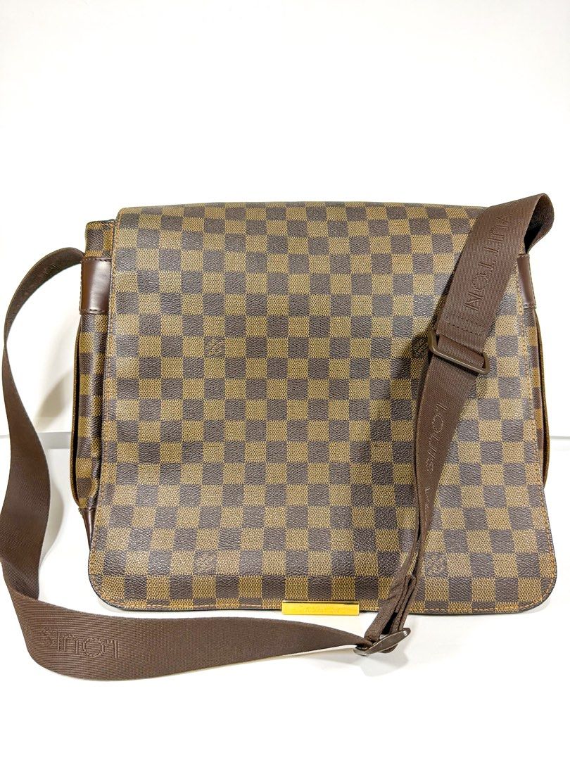 [Decluttering] Authentic Louis Vuitton Damier Ebene Messenger Bag (Category: Luxury Bags & Wallets) located in Mandaluyong City. Submitted by ronportula (Listing ID 1459509045, Image 1). Description: Material : Canvas and leather Length : 32 cm Height : 28 cm Width : 8 cm Shoulder strap : 26 cm - Authentic Louis Vuitton messenger bag - Damier Ebene canvas with classic checkered pattern - Brown leather trim - Front zip pocket - Adjustable shoulder