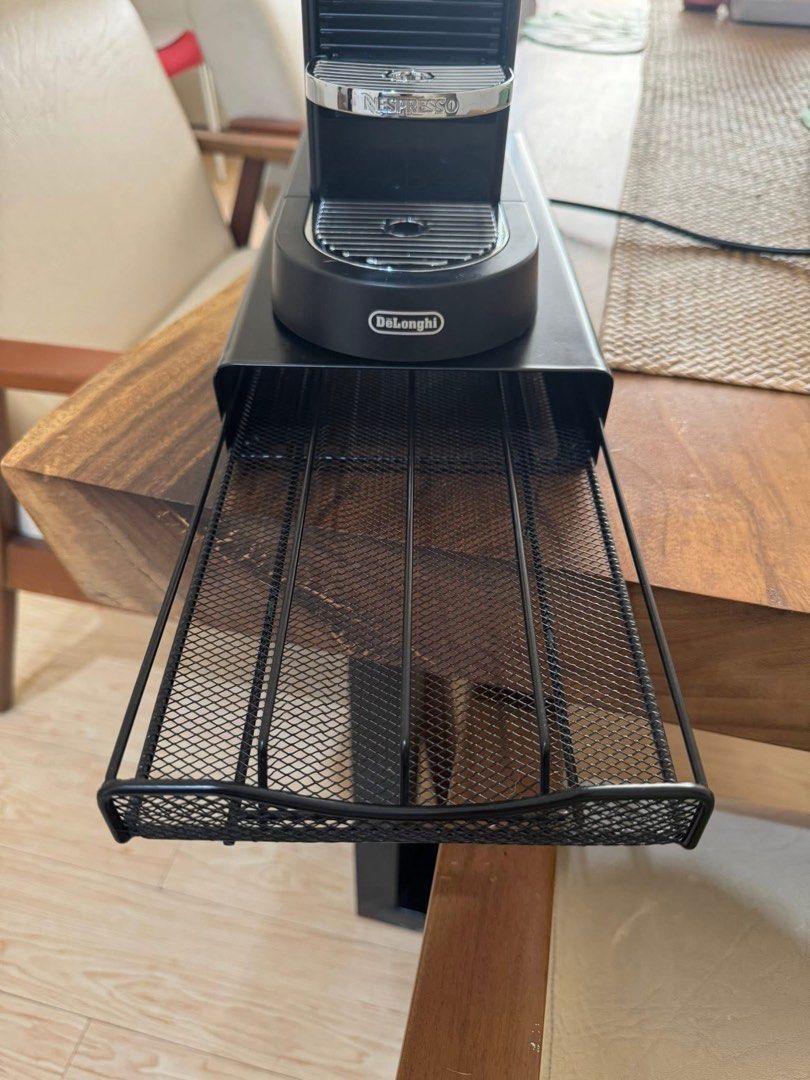 DeLonghi Nespresso Citiz with pod drawer (Category: Coffee Machines & Makers) located in Quezon City. Submitted by jeloiu09 (Listing ID 1459674309, Image 2). Description: - Black DeLonghi Nespresso Citiz coffee machine - Convenient slide-out drawer for coffee pods - Simple to use for your daily coffee needs - Detachable water tank for easy refilling - Compact design, ideal for small kitchens.