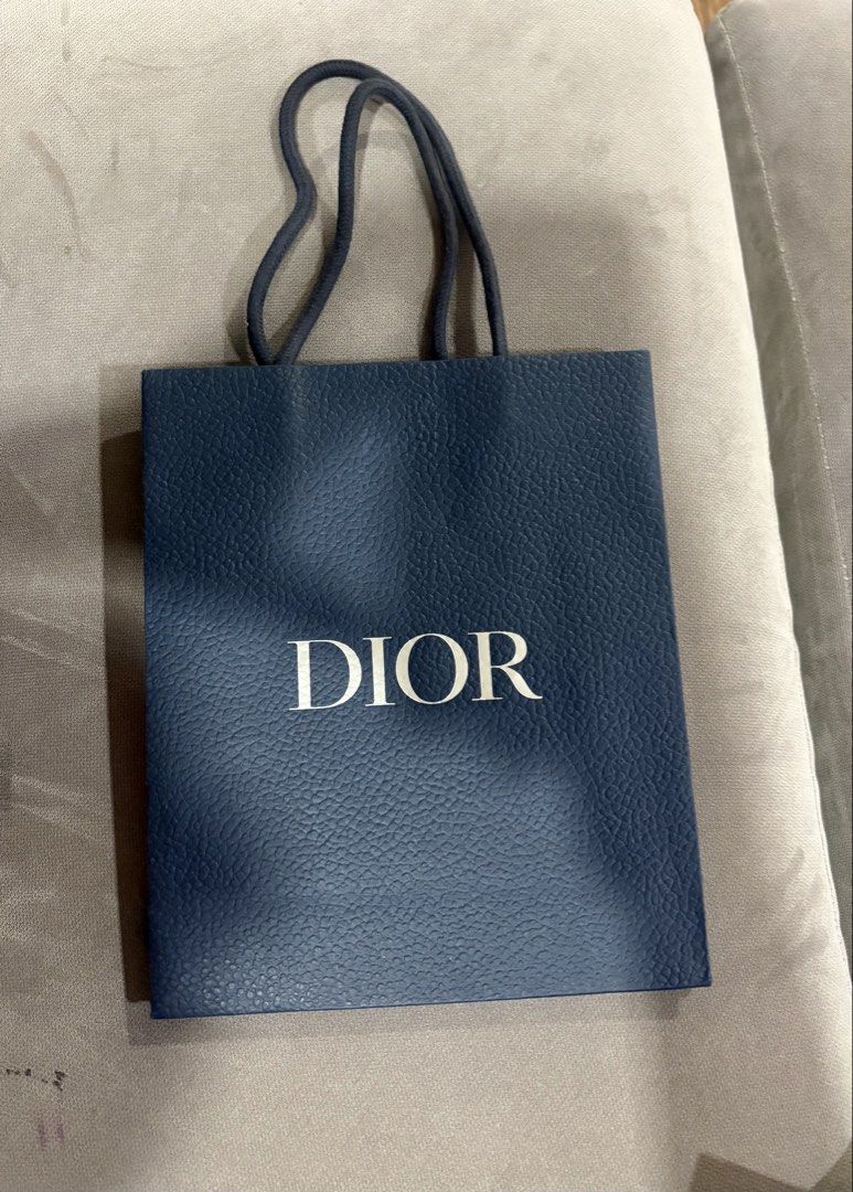 Dior Navy Blue Paper Shopping Bag (Category: Luxury Bags & Wallets) located in Manila. Submitted by curatedclosetbyj (Listing ID 1459583763, Image 1). Description: - Authentic Navy Blue Dior Paper Shopping Bag - fits makeup, wallets, and perfumes .