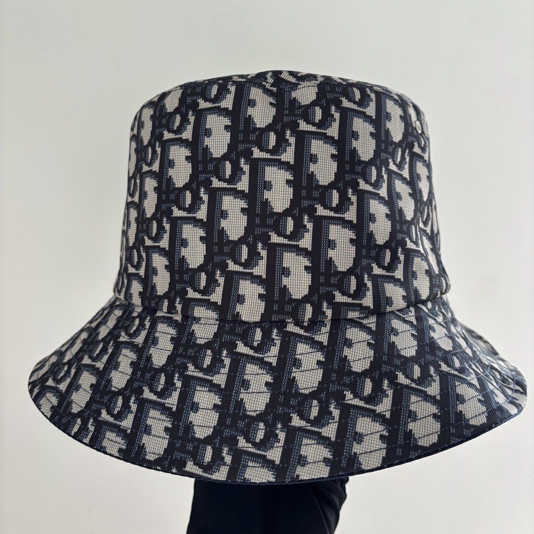 Dior Teddy-D Reversible Bucket Hat (Category: Luxury Accessories) located in Taguig. Submitted by slggg (Listing ID 1459527925, Image 1). Description: Authentic Dior Teddy-D Reversible Bucket Hat Brand New. Size 57 - Made in Italy - With Box and felt paper - Comes with original tags Meet Up: Taguig/BGC Area.