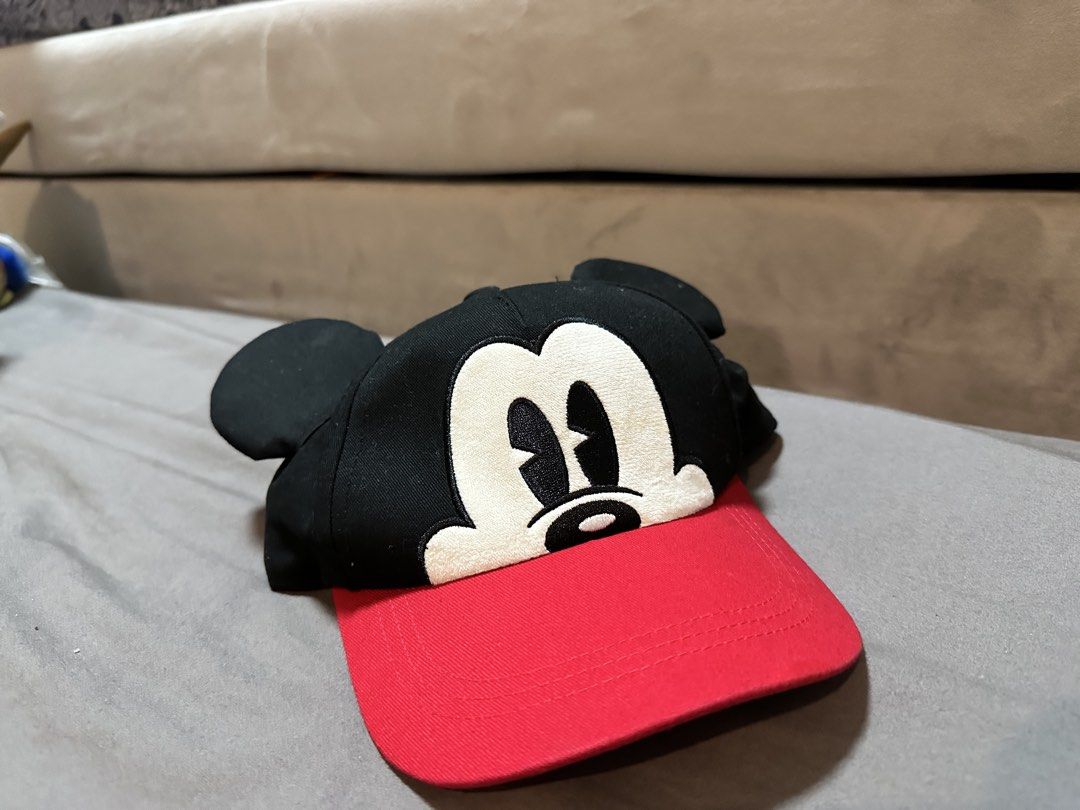 Disney Mickey Mouse & Friends Black Red Cap (Category: Babies & Kids Fashion) located in Leyte. Submitted by handmedownp (Listing ID 1459589251, Image 1). Description: - Features a large, detailed embroidered Mickey Mouse face on the front. - Adjustable strap at the back ensures a comfortable, customized fit. - Authentic, officially licensed Disney merchandise. - perfect for Disneyland cap of your kid .